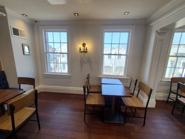 restaurant dining area walls painted white. Restaurant is located in Montgomery county Maryland.