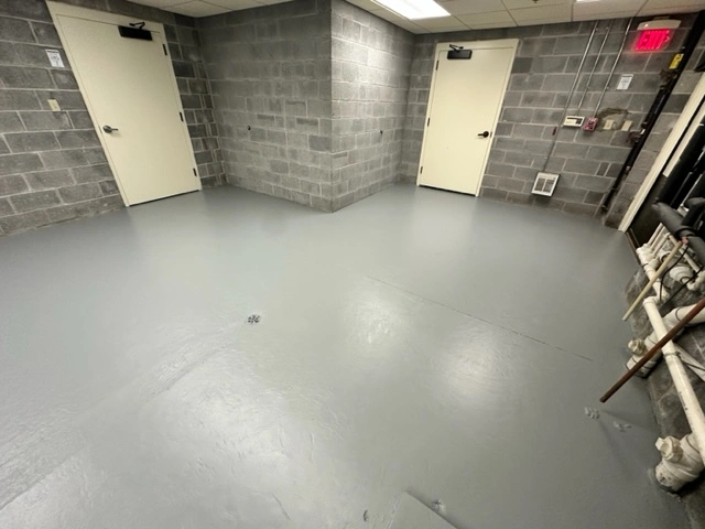 building exit hallway floor with epoxy paint.