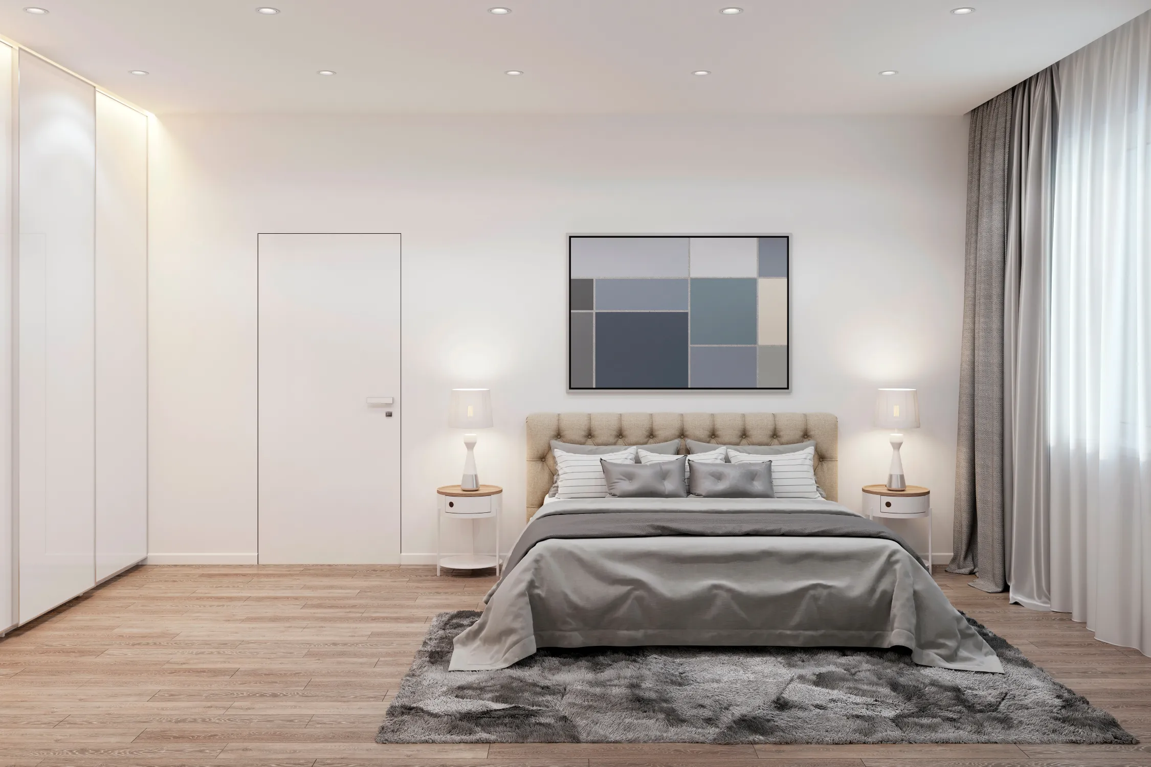 bedroom with white walls and a bed with grey sheets in the middle.